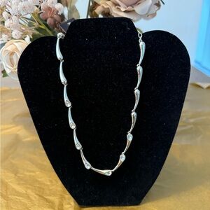 Silver toned necklace with CZ’s. NWT